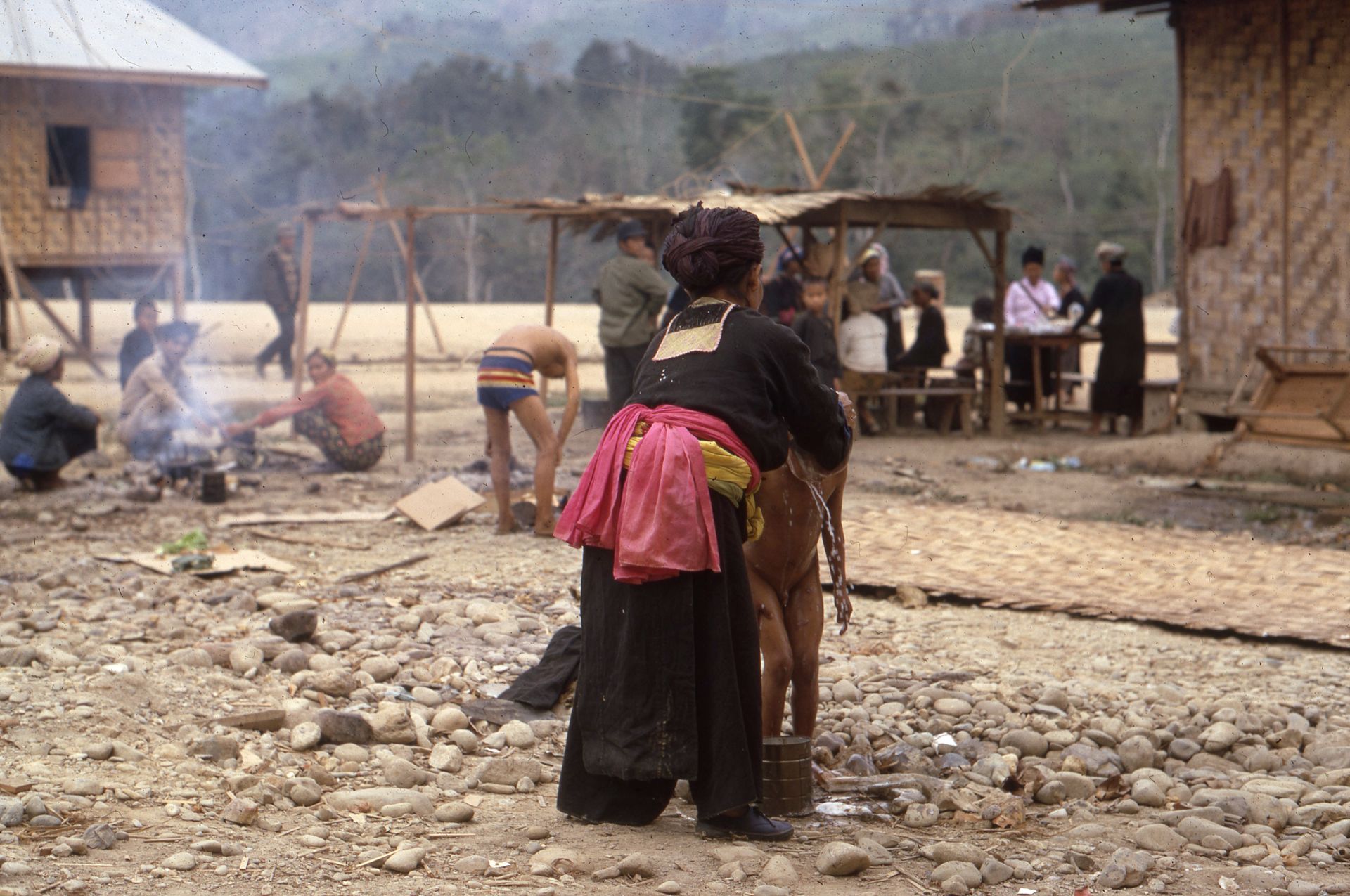 Child bathing at Ban Xon, Laos (LS-272) in 1971.