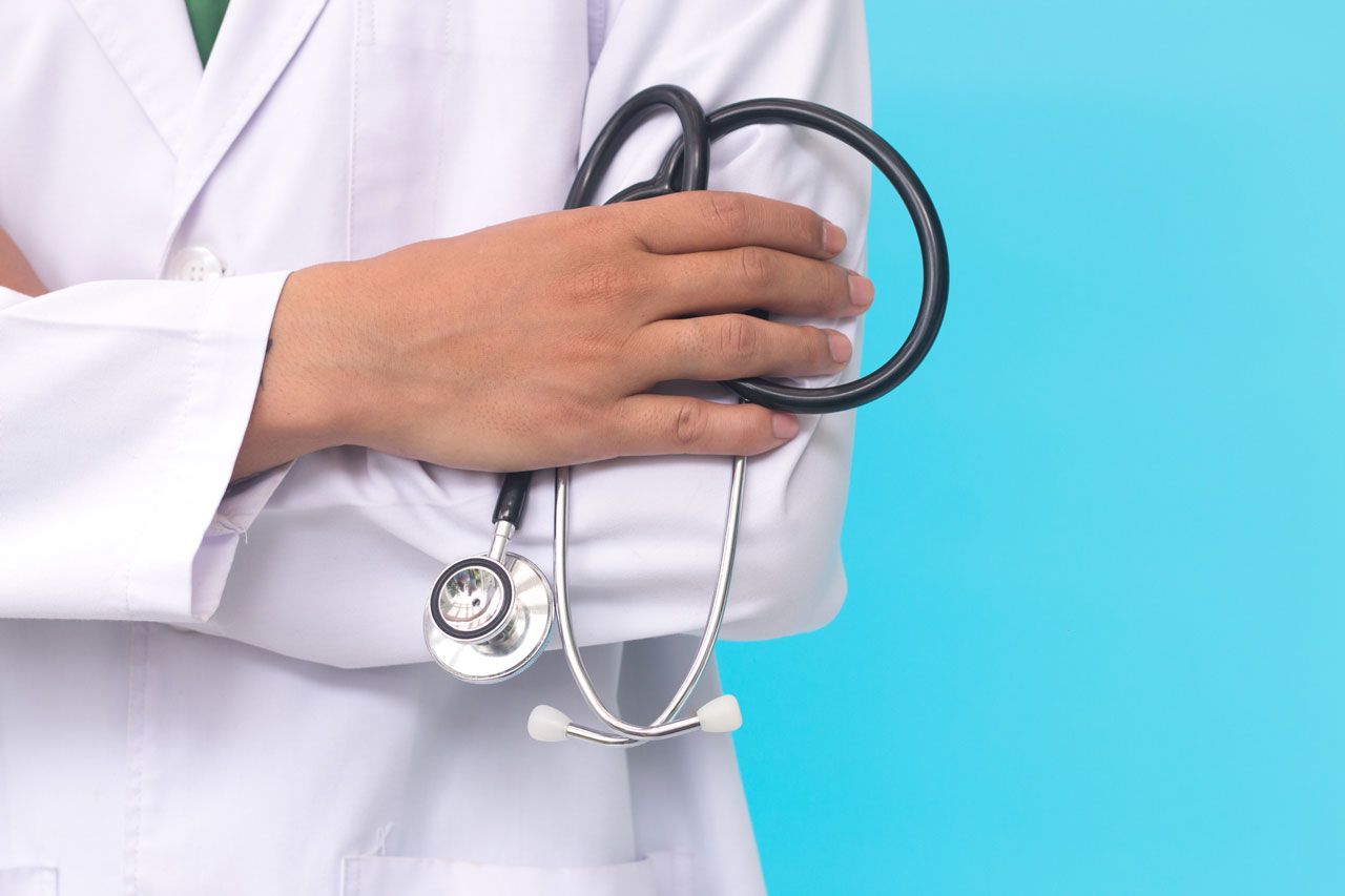 Doctor Holding Stethoscope — San Diego, CA — Gaslamp Medical Center