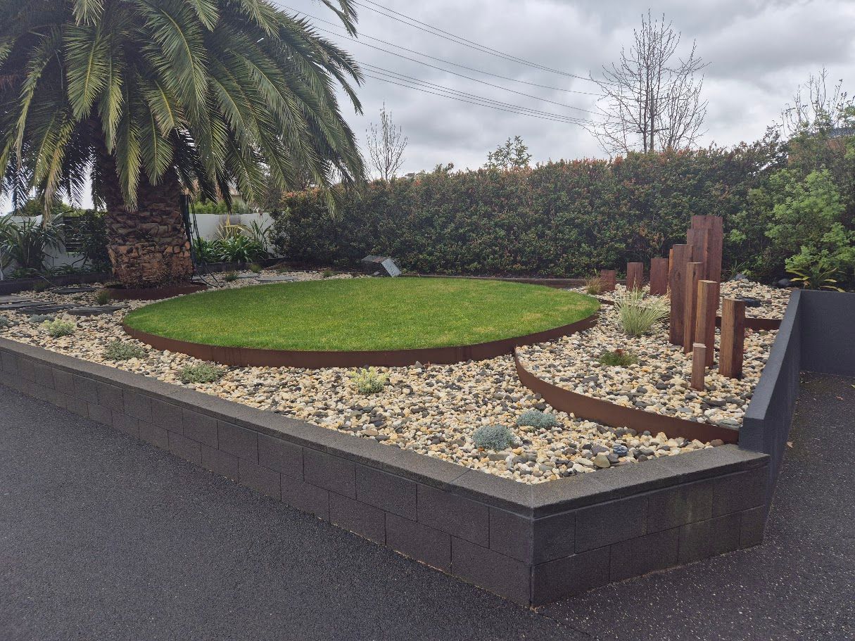 There is a palm tree in the middle of the garden.