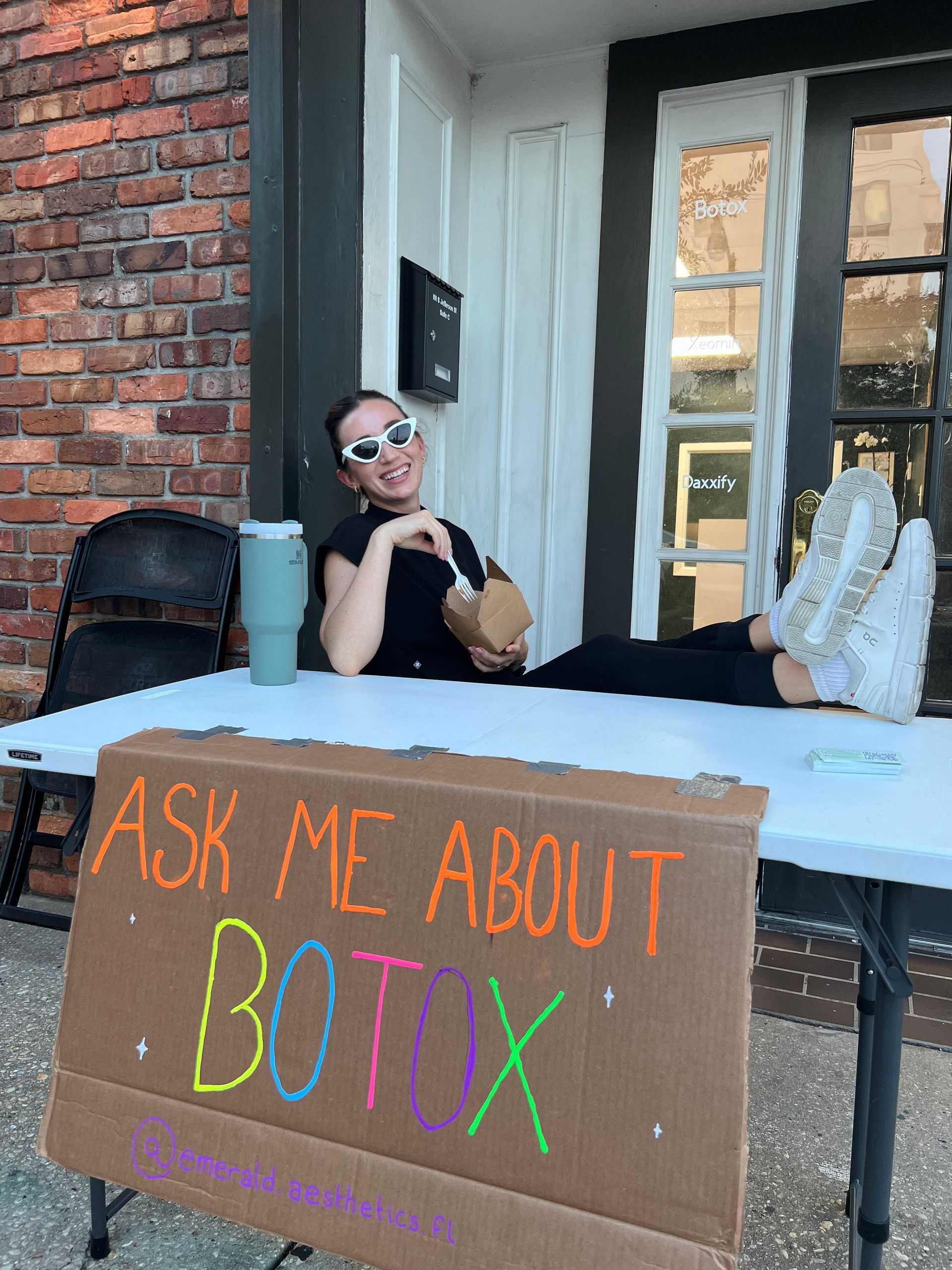 Woman behind a table with 