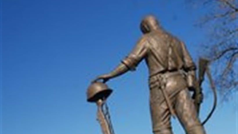 Kirby's Tucker Memorial Cemetery Statue Back