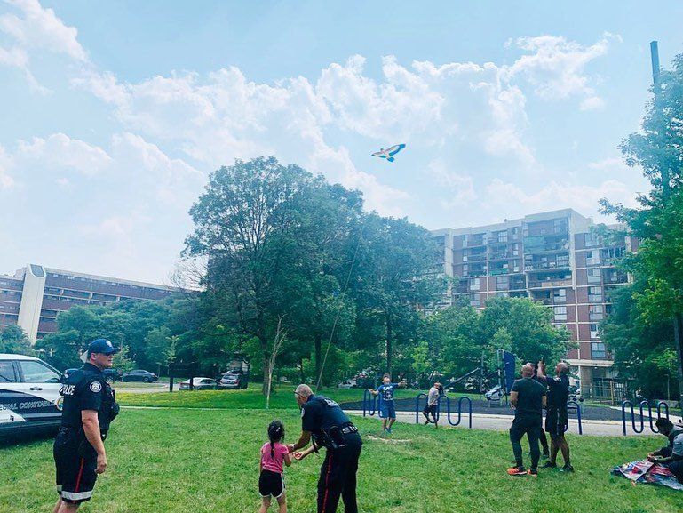 NCOs playing with youth in the park