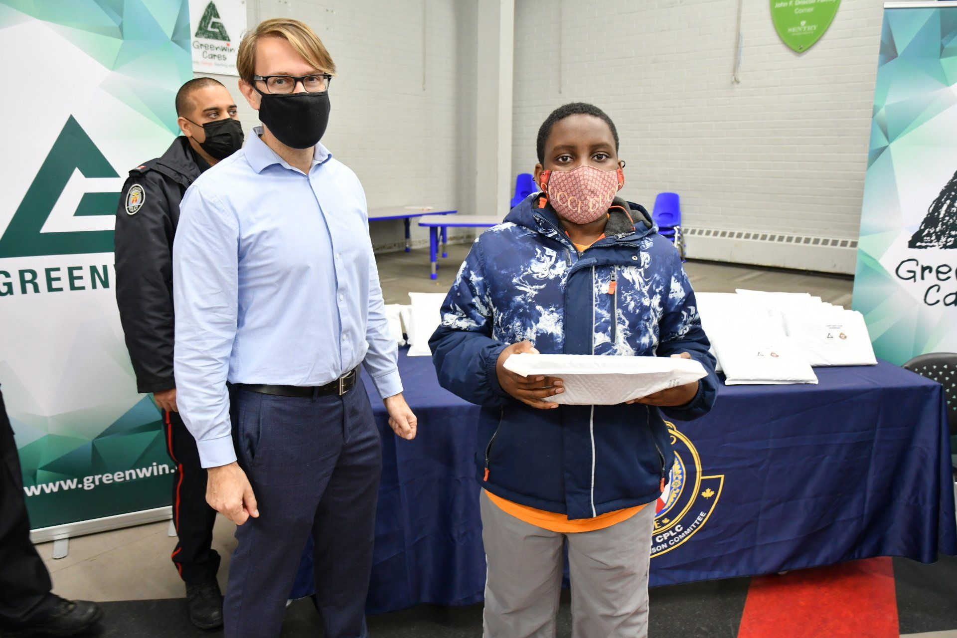 Student receiving laptop