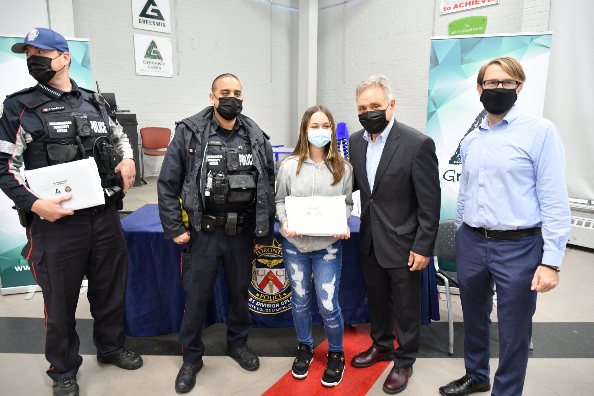 Student receiving laptop