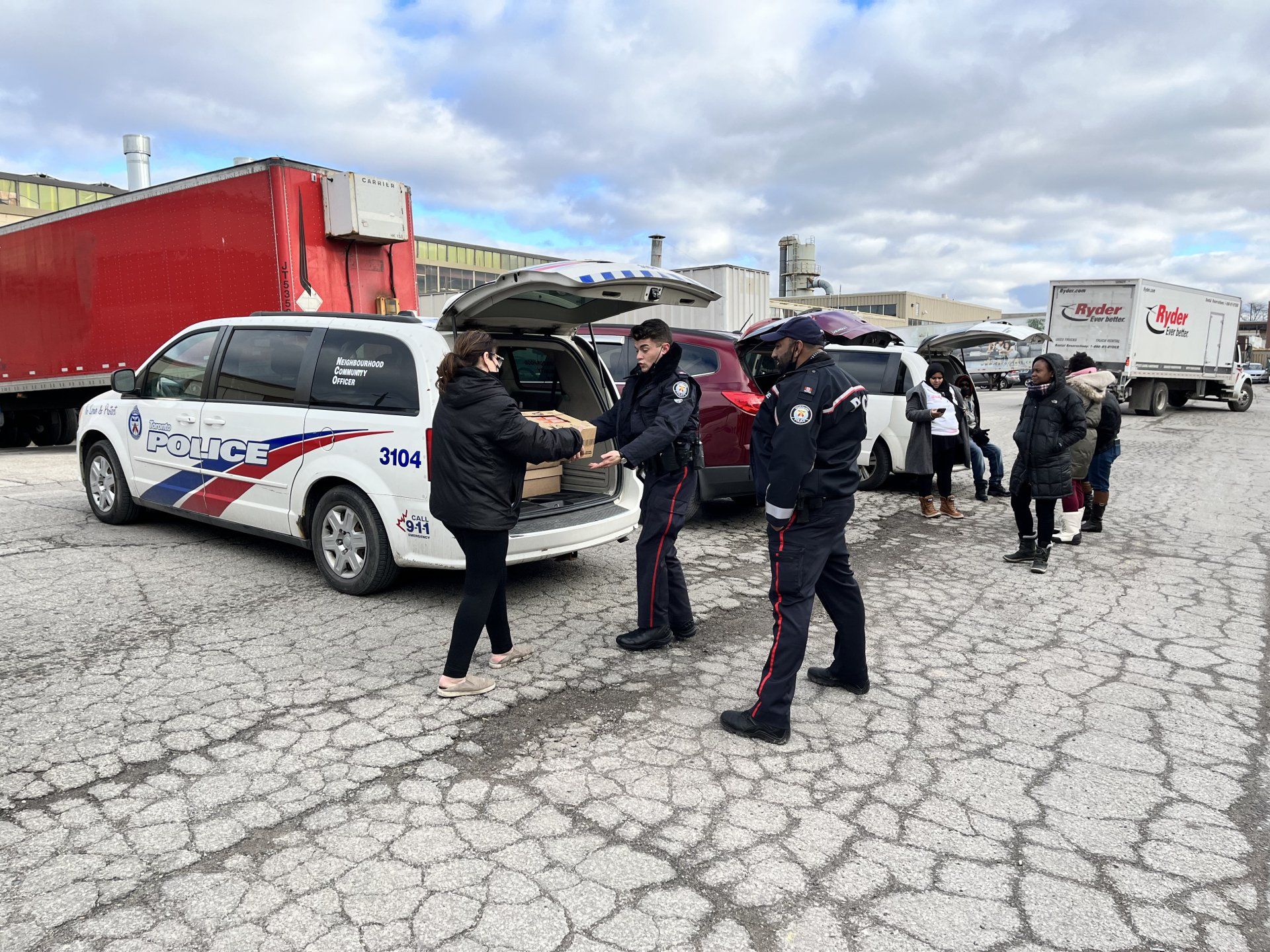NCOs loading Van with Food