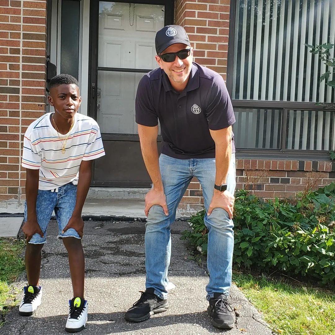 CPLC member playing with youth