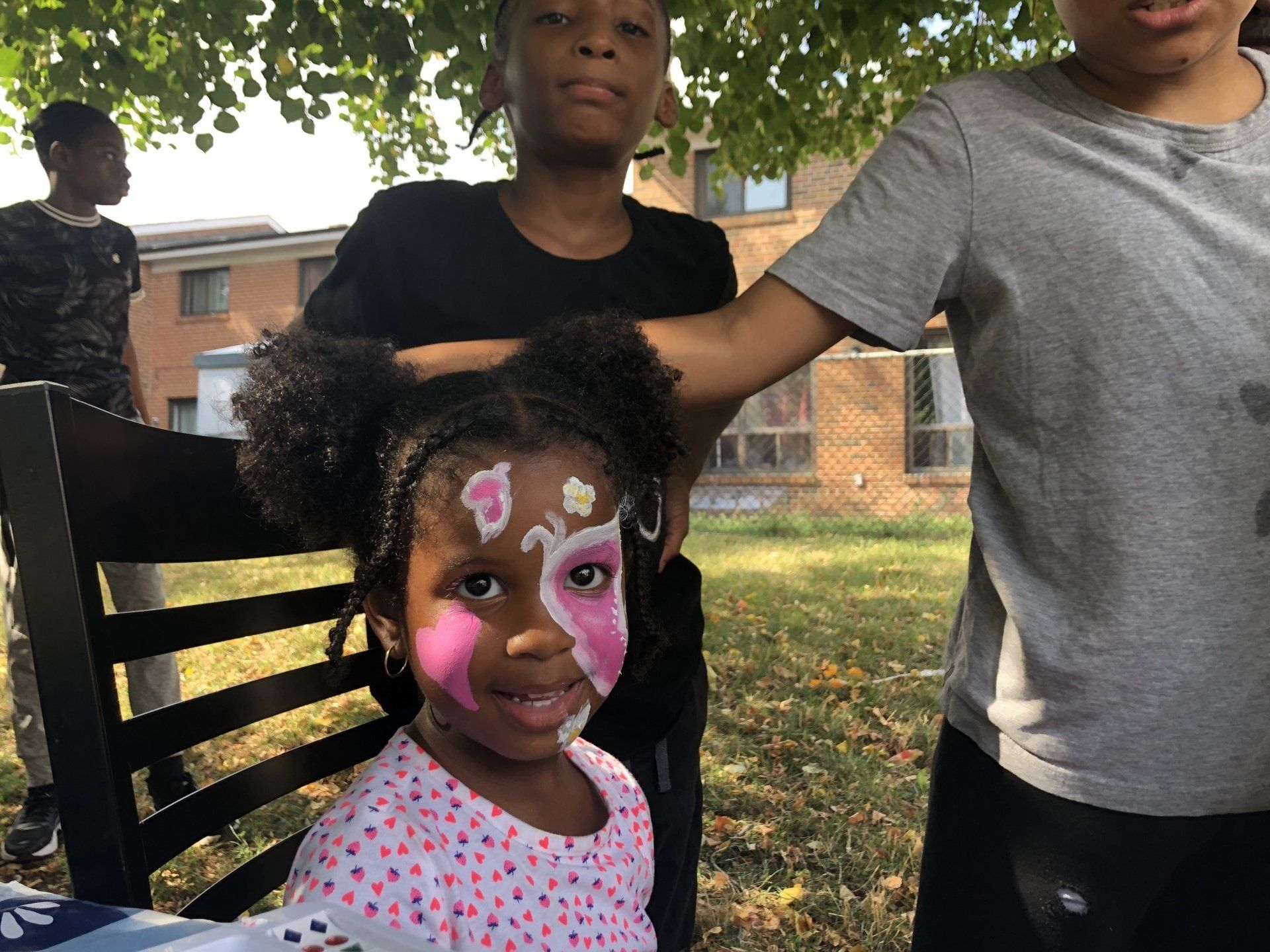 Youth with face painted