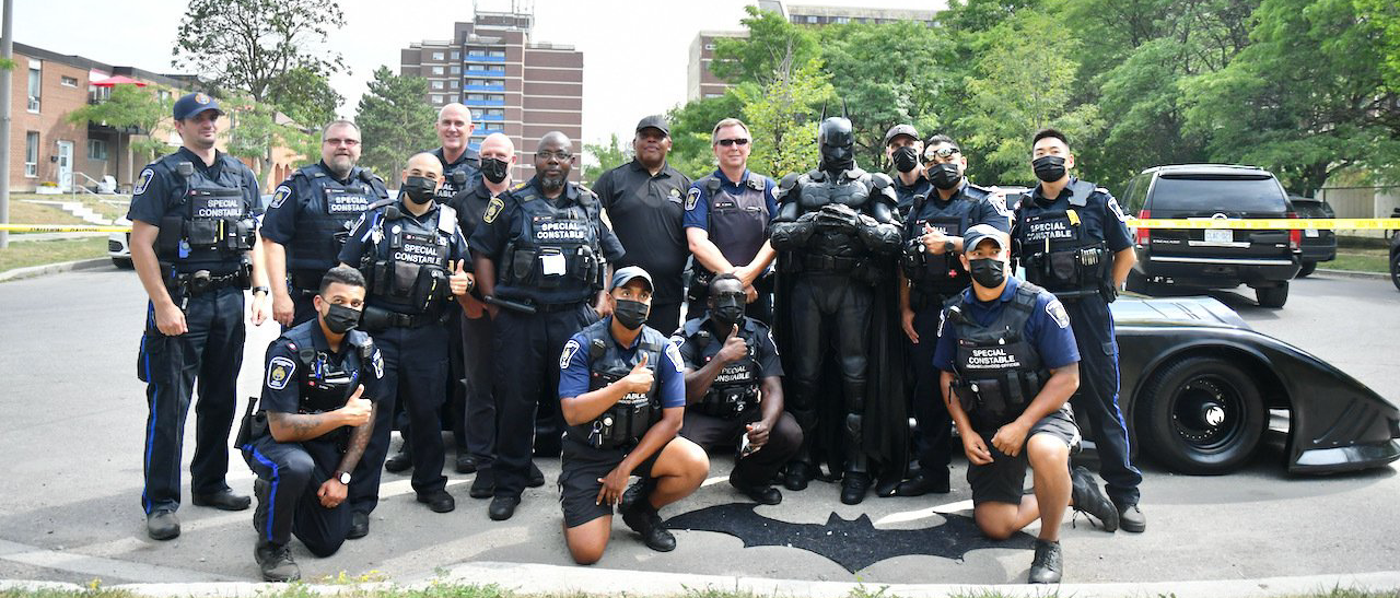 TCH constables taking group photo with batman