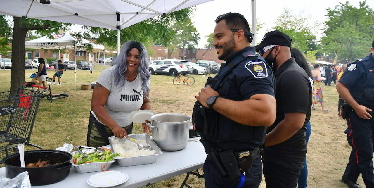 Community member serving food