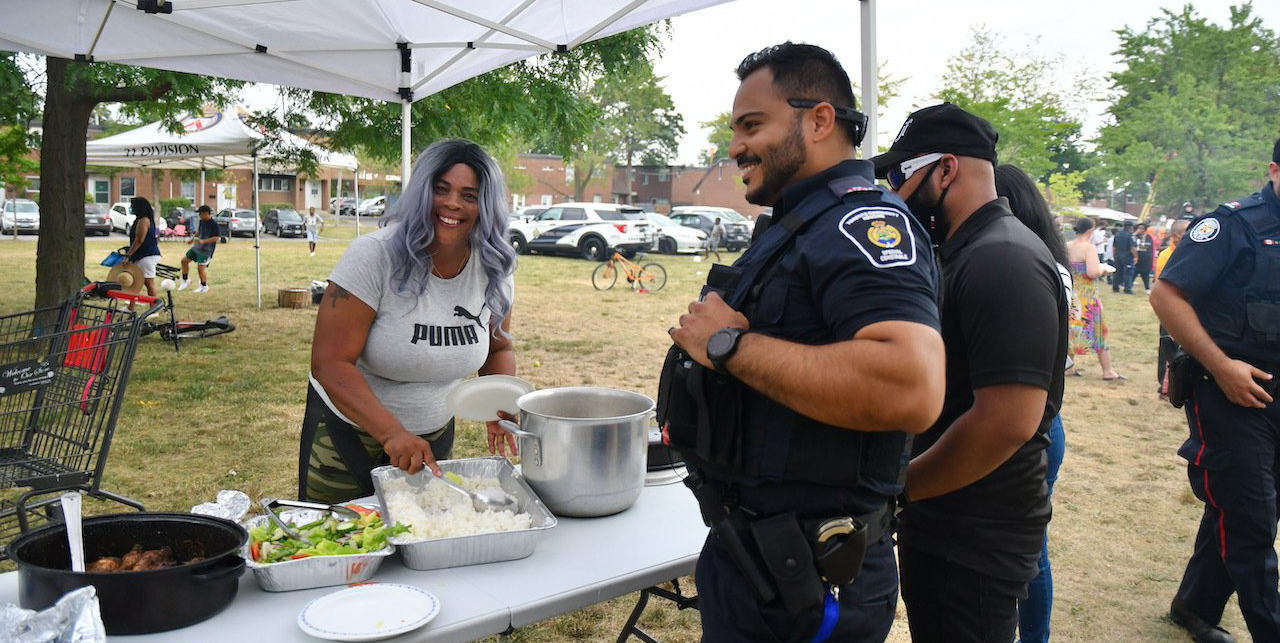 Community  member serving food