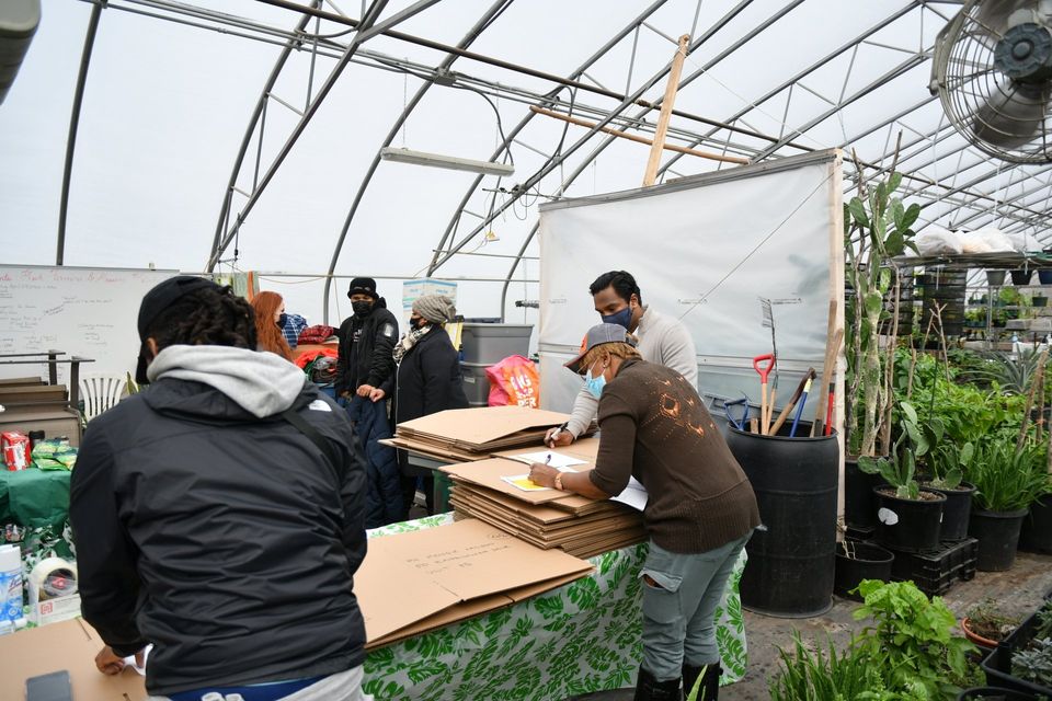 Volunteers preparing boxes