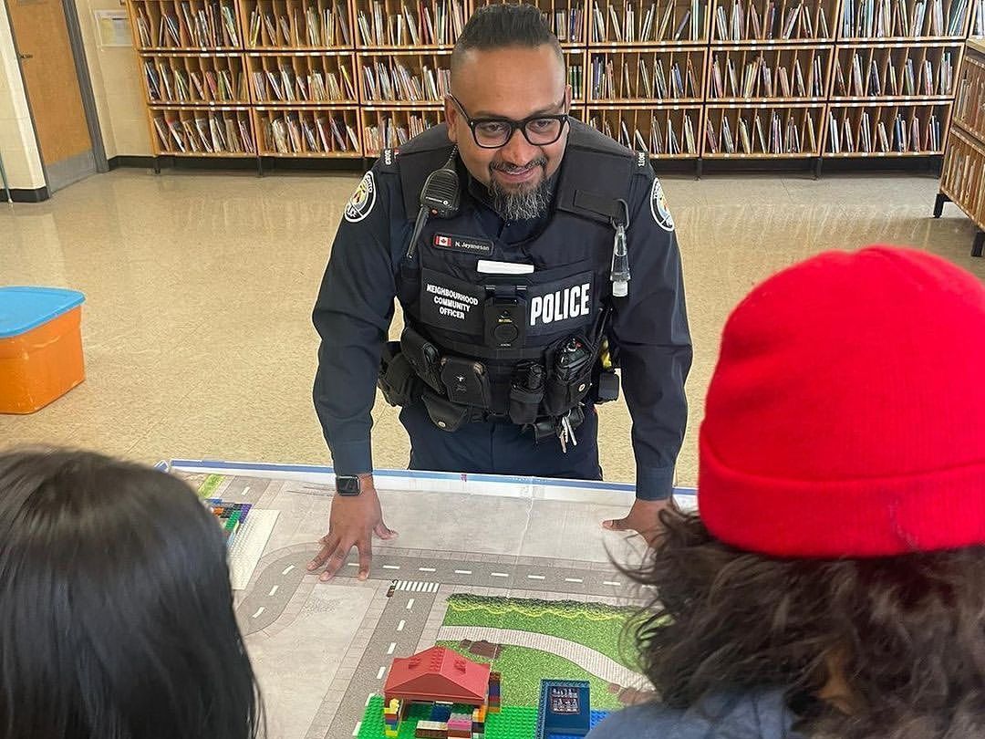 Officer talking to youth