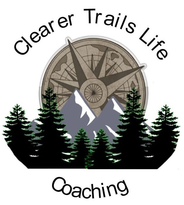 A logo for clearer trails life coaching with a compass and trees