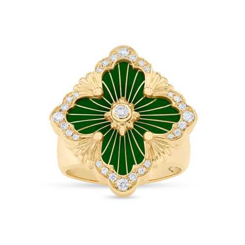 Un anello in oro giallo con un fiore verde e diamanti