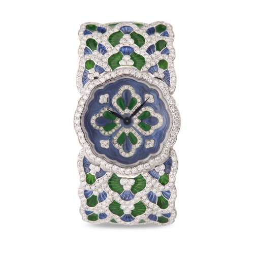 Un orologio blu e verde con diamanti su sfondo bianco