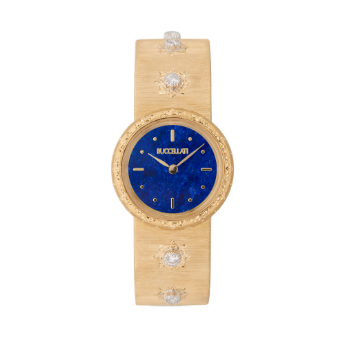 Un orologio con quadrante blu e cinturino in legno