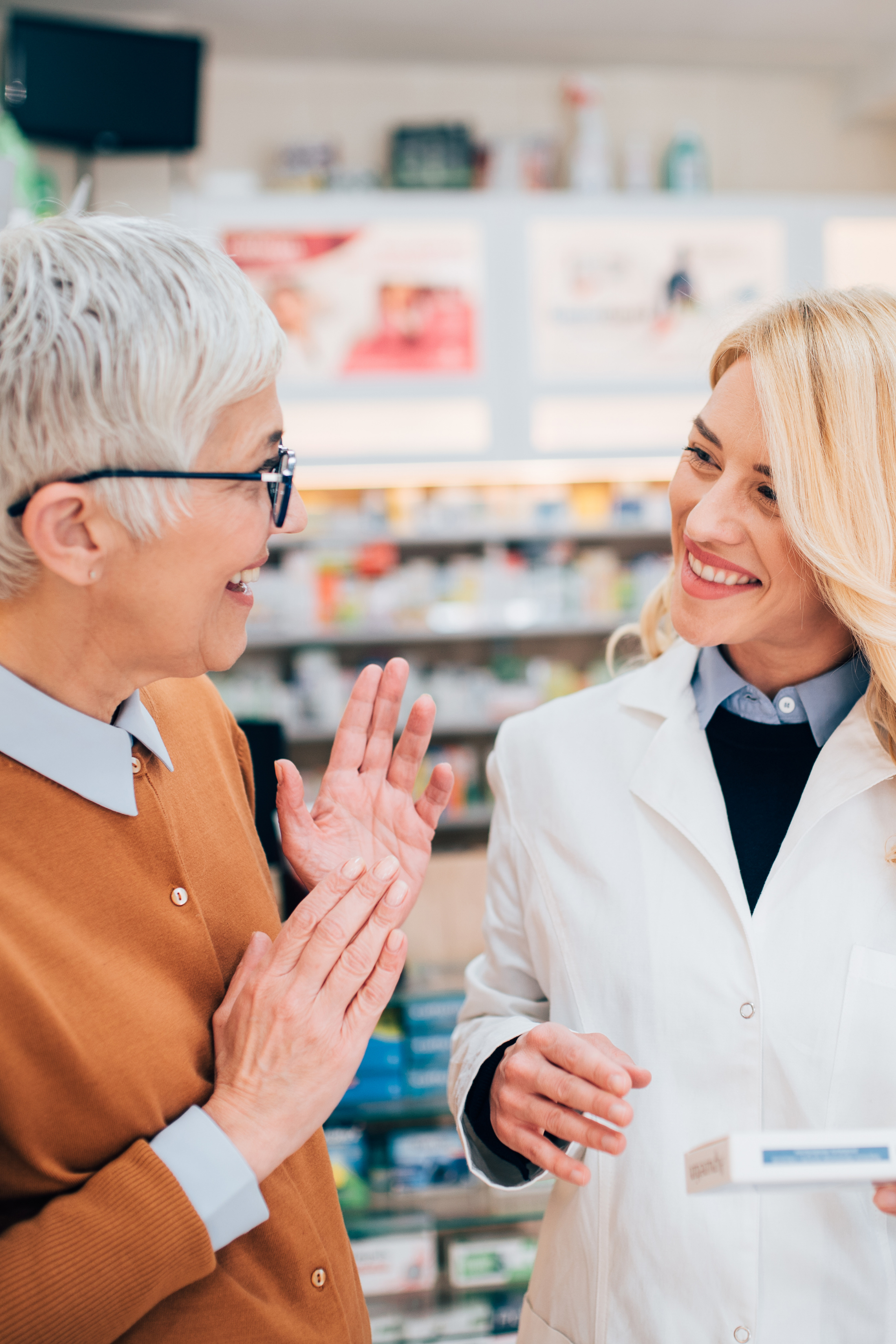 Pharmacist helping Medicare Part D help on Rx coverage