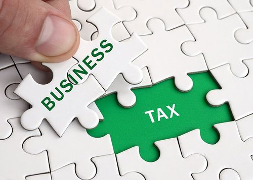 Personal Income Tax Preparation — Image With Words Business And Tax In Treasure Coast, FL