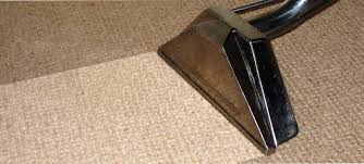 Carpet wand doing hot water exttraction showing the results on a low profile poly carpet