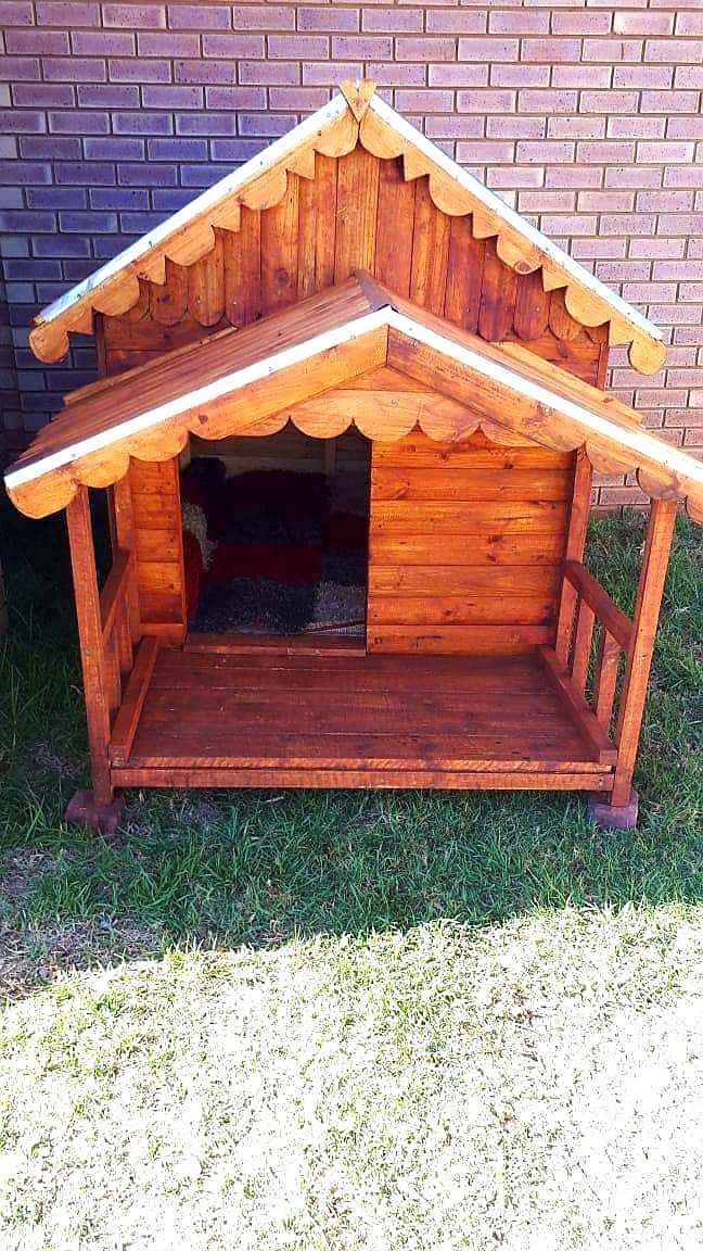 A wooden dog house available from Pets and the City in Pretoria East.