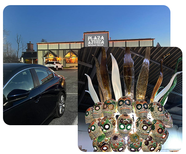 A car is parked in front of plaza azteca