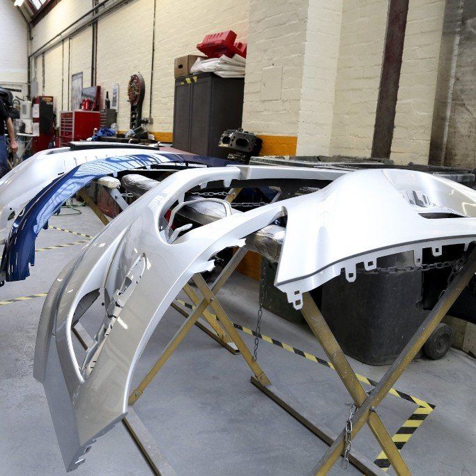 A bunch of bumpers are sitting on a wooden stand