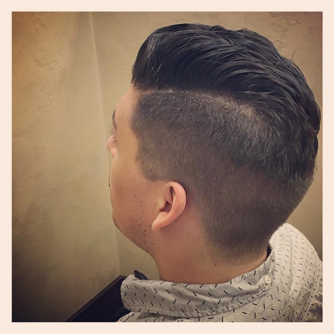 Man having stylish hair cut