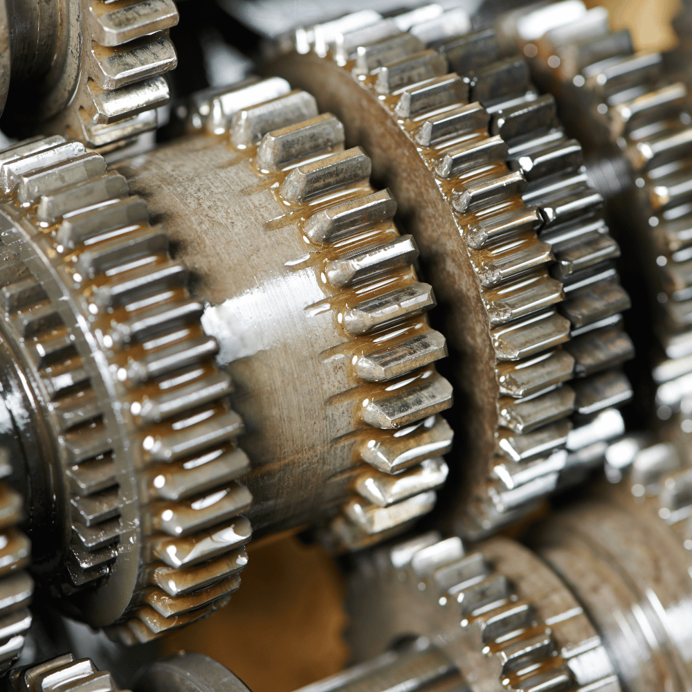 A close up of a gearbox with a lot of gears