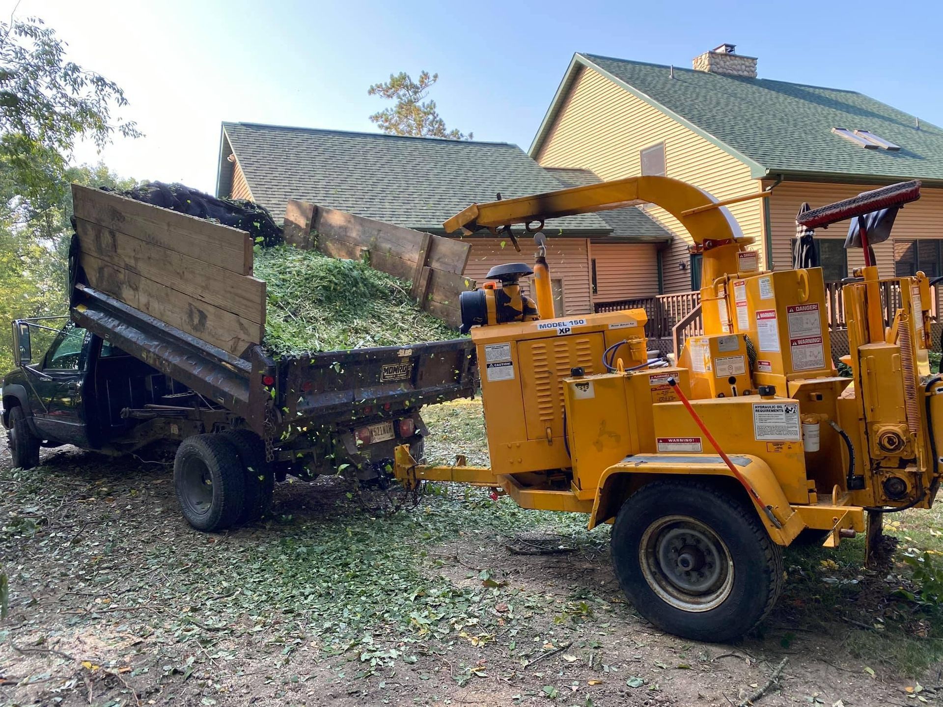 Leaves behind the truck — Merrillville IN — El Errante Tree & Landscaping Service