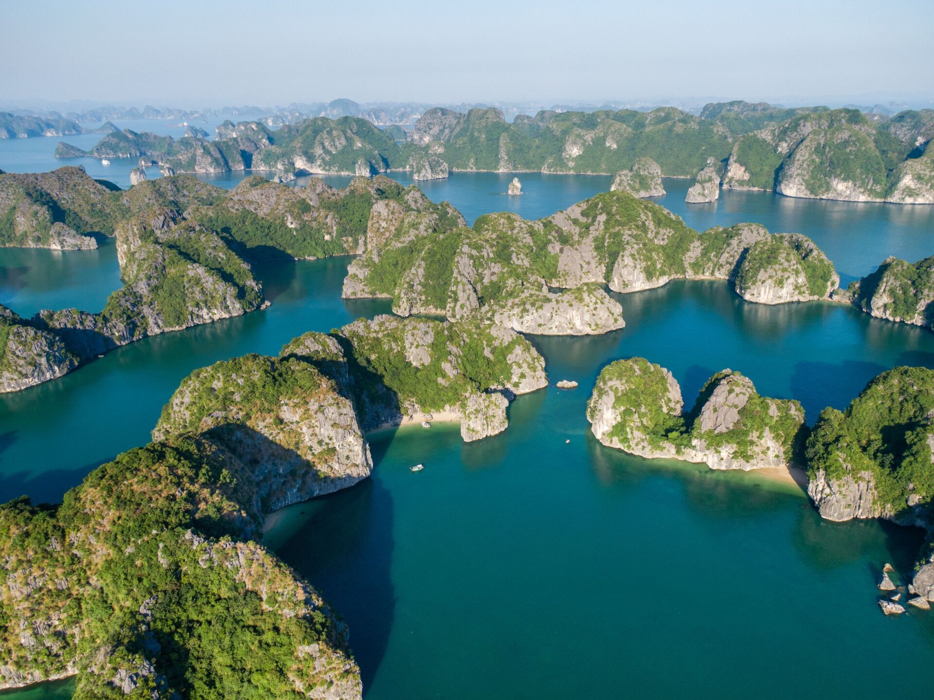 An aerial view of a large body of water surrounded by islands.