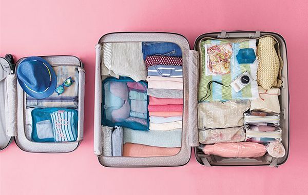 Smart carry-on bag packed with TSA-friendly items