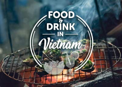 Food and drink in vietnam is being cooked on a grill.