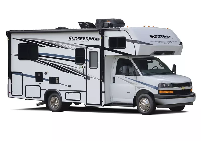 A white rv is parked on a white background.