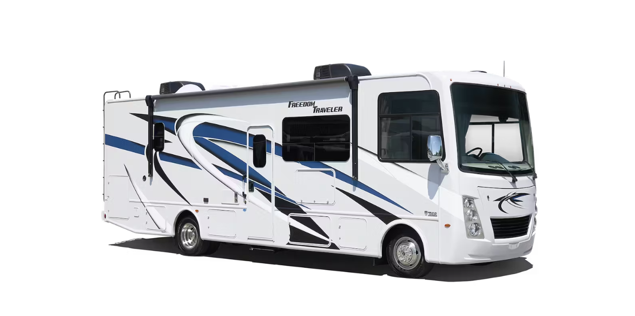 A white and blue rv is parked on a white background.