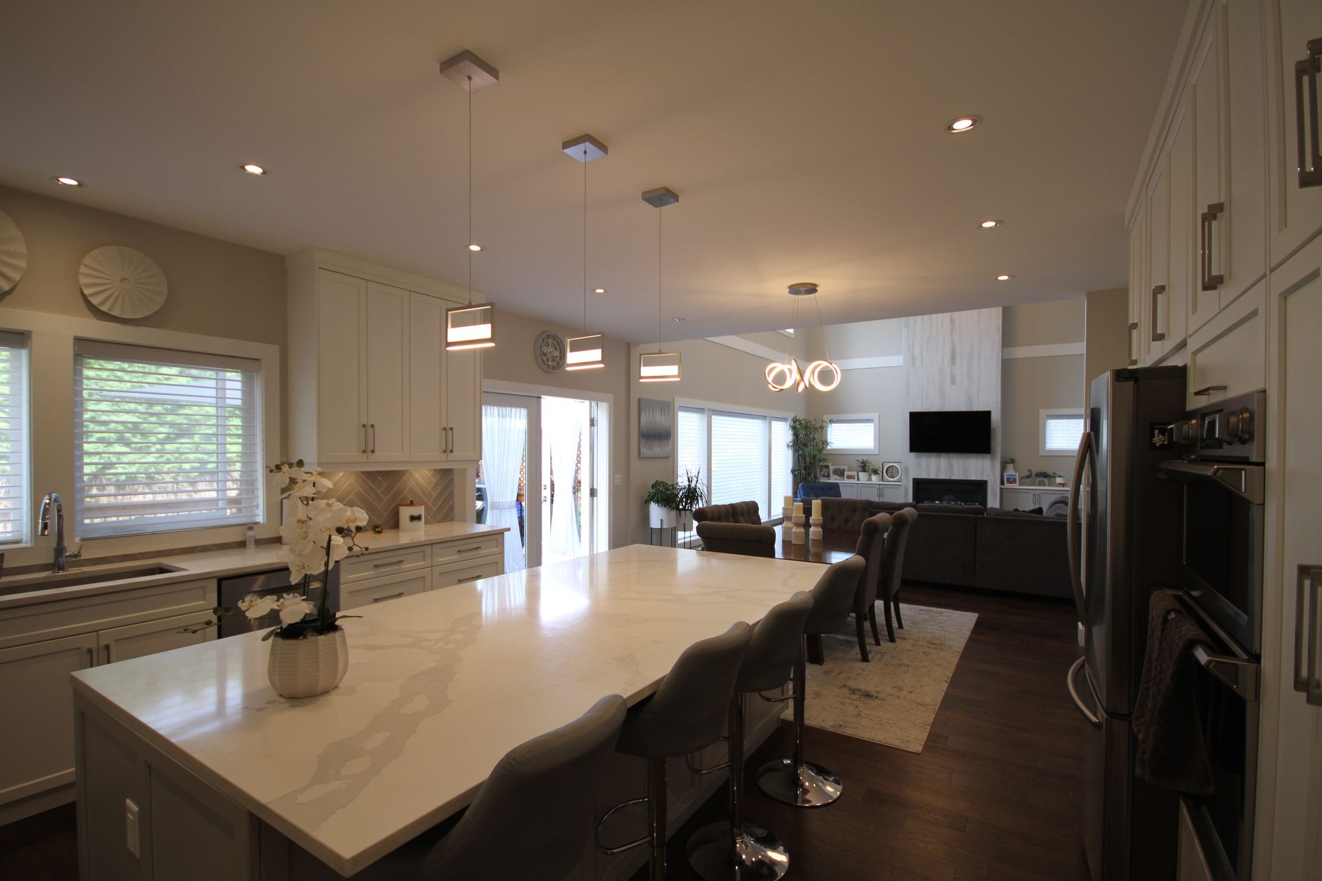 There is a large island in the middle of the kitchen.