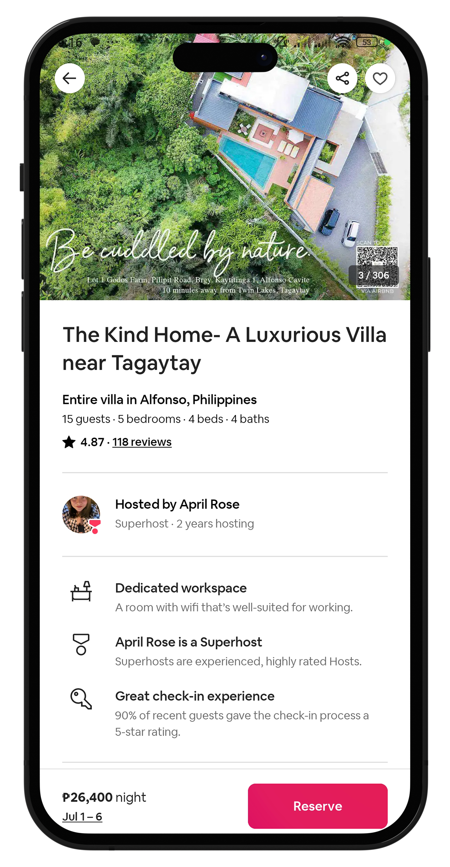 A cell phone with a picture of a house on the screen.