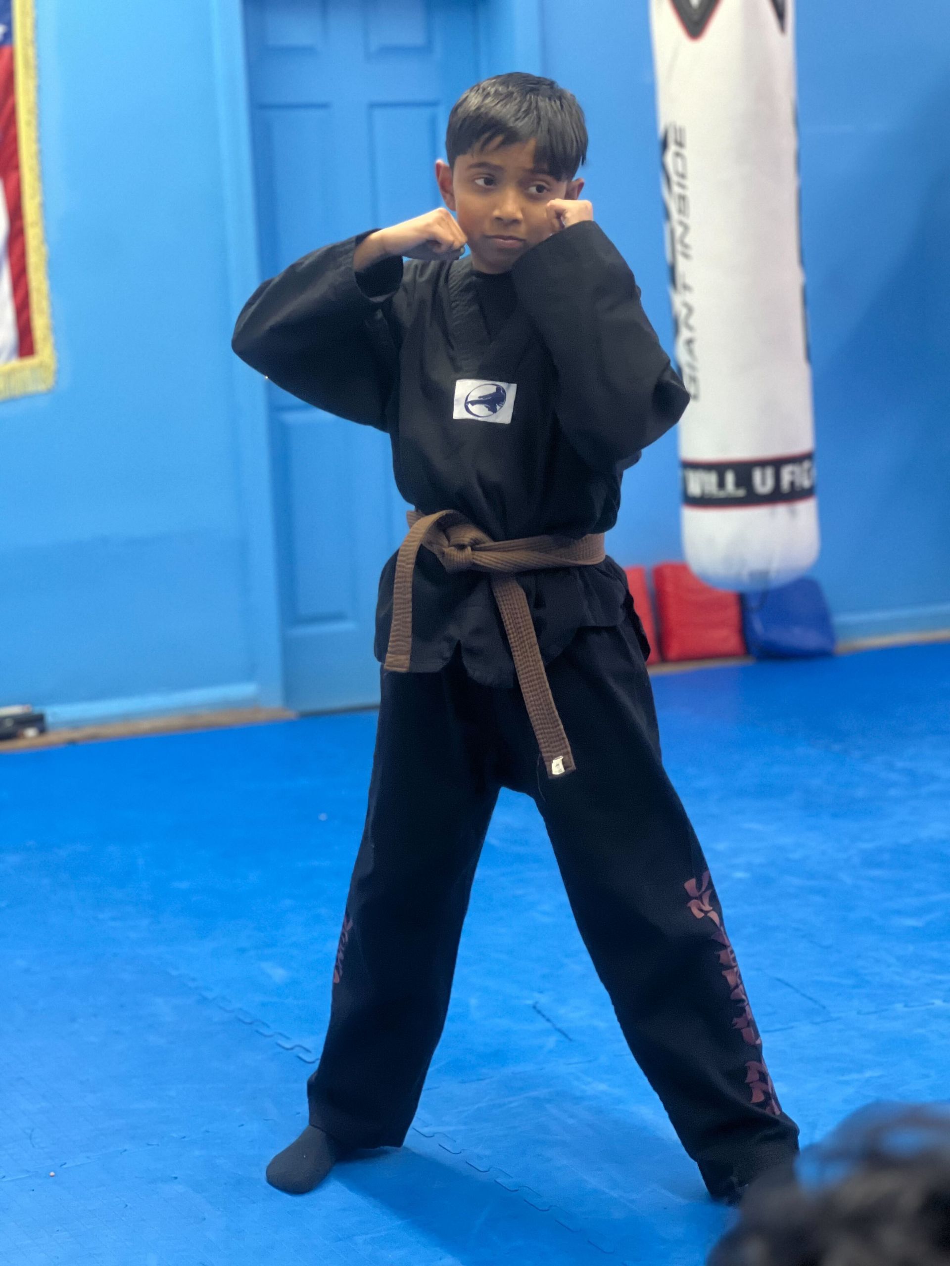 Students training cardio and strength drills at Universal Mixed Martial Arts in South Richmond Hill.