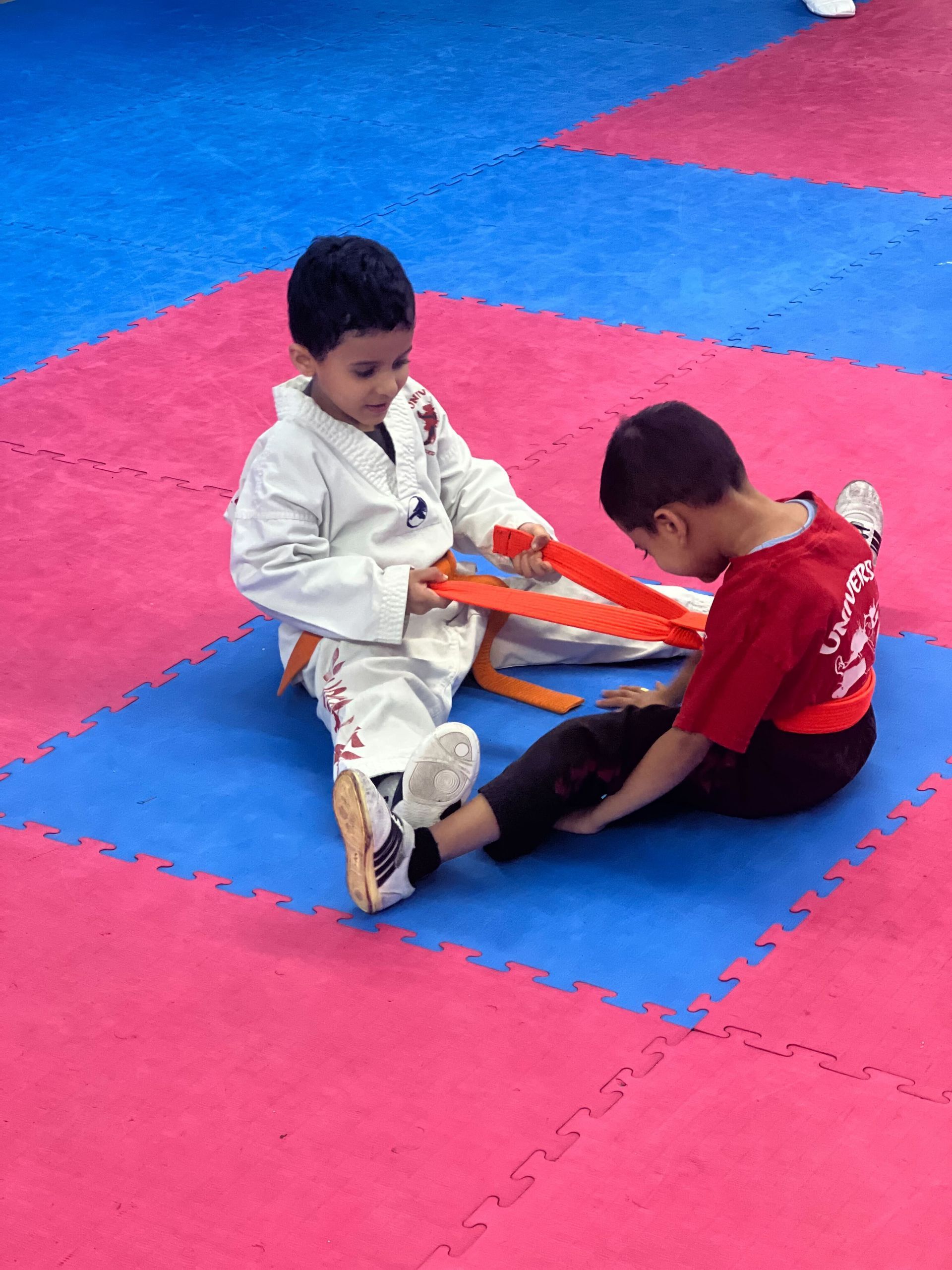 Adults training striking drills at Universal Mixed Martial Arts in South Richmond Hill, NY.
