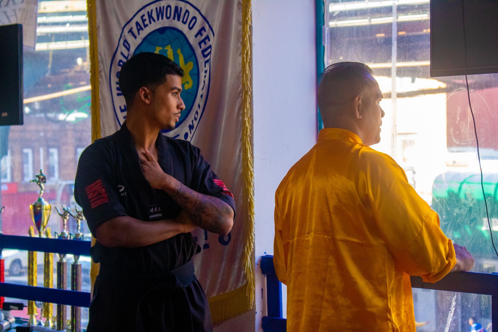 Students drilling padwork at Universal Mixed Martial Arts in South Richmond Hill, NY, building fitness and confidence.