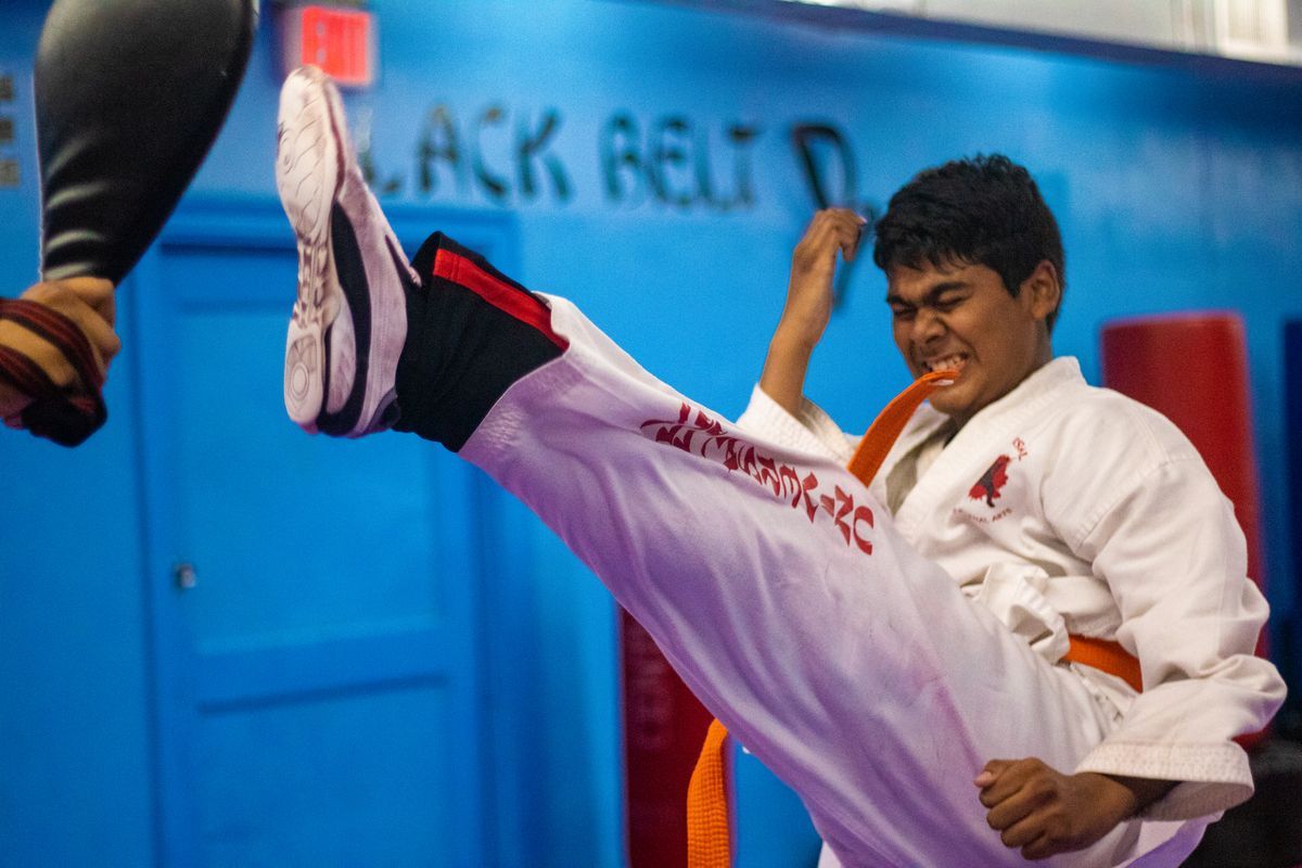 Students training Mixed Martial Arts at Universal Mixed Martial Arts in South Richmond Hill, NY.