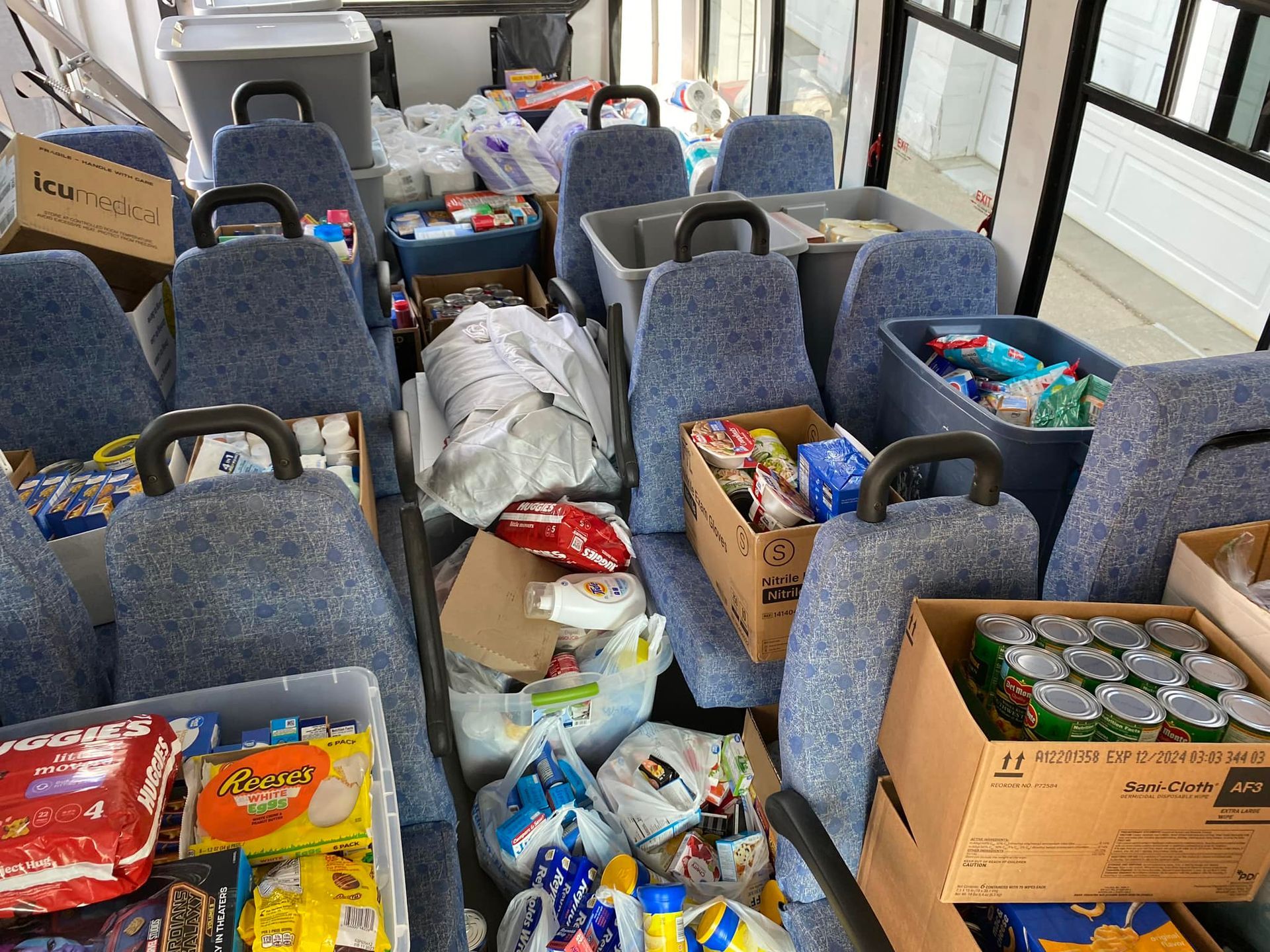 photo of a bus stuffed with items to donate to the local food pantry