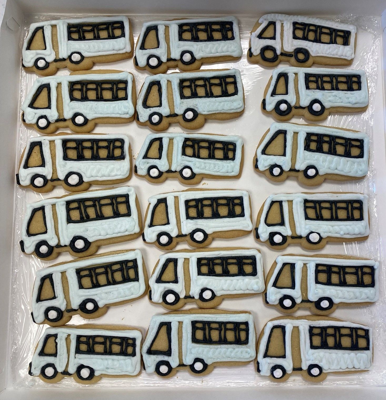 photo of cookies in the shape of a shuttle bus