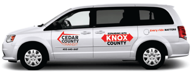 photo of a Cedar County Transit minivan with Knox County expansion announced on it