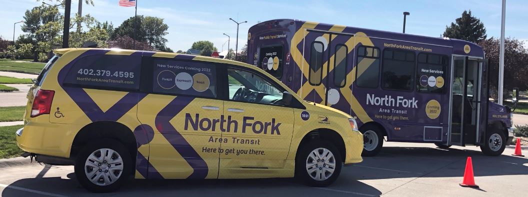 photo of North Fork Area Transit minivan and shuttle bus