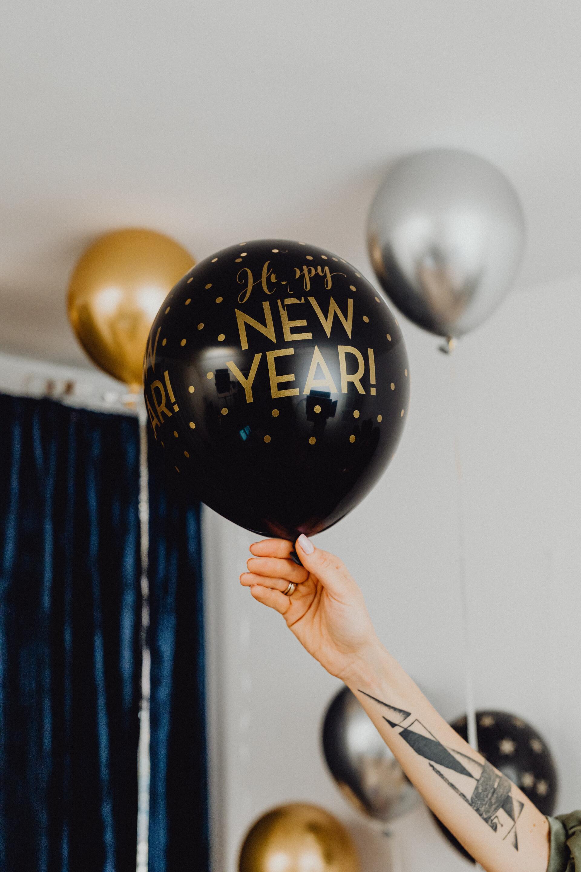 photo of balloons with Happy New Year on them