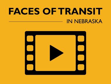 yellow box with black icon of a play button inside of a film strip with the words Faces of Transit in Nebraska