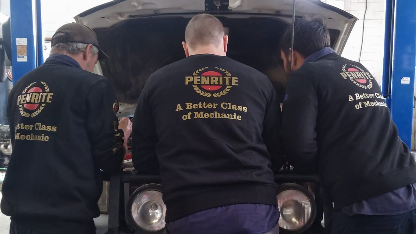 Three Mechanics Fixing The Car Engine — Car Mechanics in The Tablelands Region, QLD