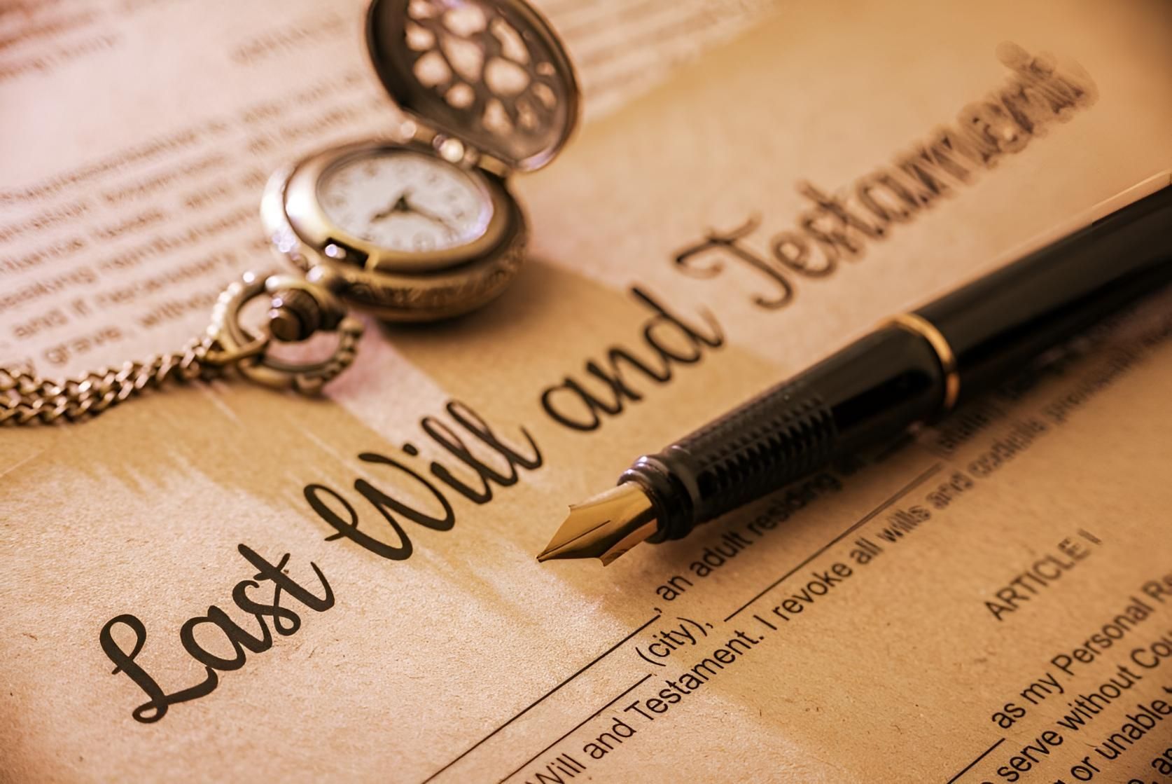 A Fountain Pen is Sitting on Top of a Last Will and Testament — Bradley J Bragg - Solicitor in Mareeba, QLD