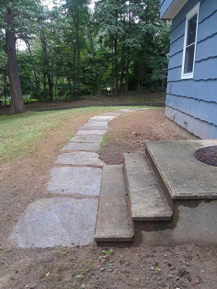 side porch with stone walkway
