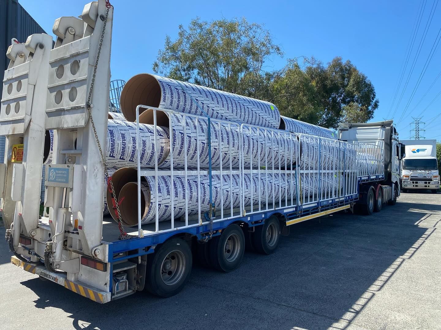 A construction site with a fence and a sign that says close.